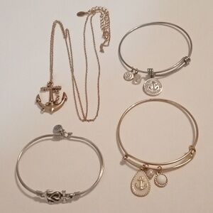 #832.  3 Piece Silver And Gold Toned Nautical Anchor Necklace & Bracelet Bundle